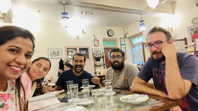 At Rustom’s in Delhi, April 2022, waiting for food. L-R: Divya, Anita, Prateek, Souvik and Paul.